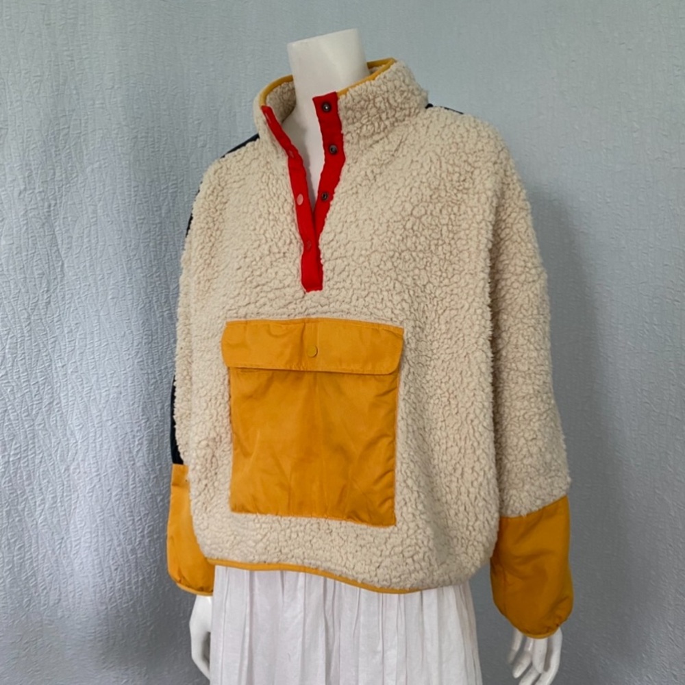 Cozy Cream Teddy Jacket with Red and Yellow Accents